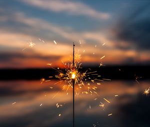 Preview wallpaper sparkler, sparks, blur, sunset