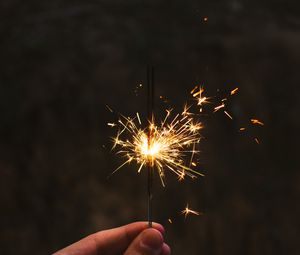 Preview wallpaper sparkler, sparks, hand, glow