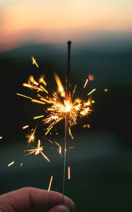 Preview wallpaper sparkler, sparks, hand, focus