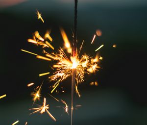 Preview wallpaper sparkler, sparks, hand, focus