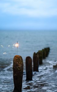 Preview wallpaper sparkler, sparks, sea, stones