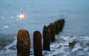 Preview wallpaper sparkler, sparks, sea, stones