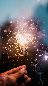 Preview wallpaper sparkler, sparks, smoke, hand