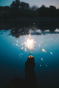 Preview wallpaper sparklers, hand, sparks, bright, twilight