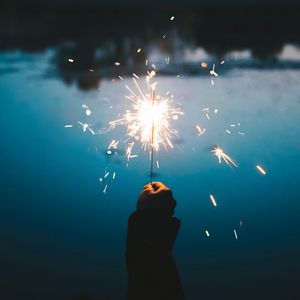 Preview wallpaper sparklers, hand, sparks, bright, twilight