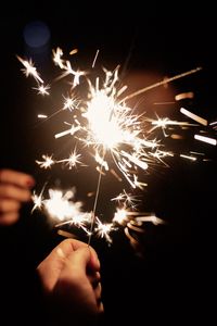 Preview wallpaper sparklers, hand, sparks, glow, dark