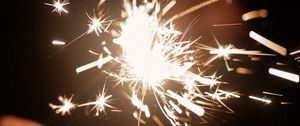 Preview wallpaper sparklers, hand, sparks, glow, dark