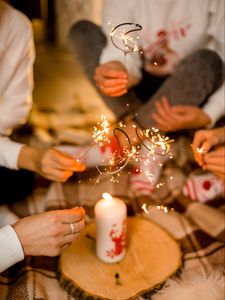 Preview wallpaper sparklers, sparks, candle, people, holiday