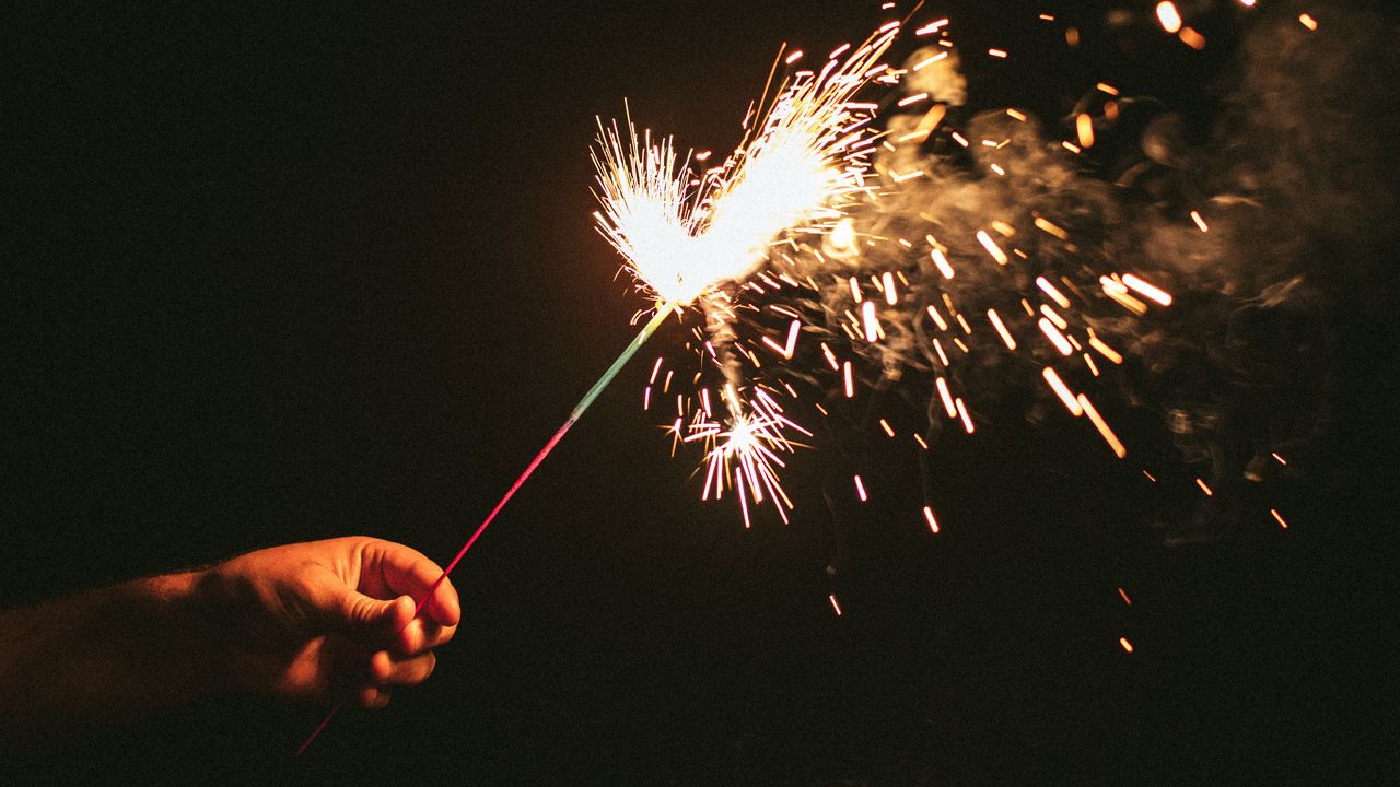 Wallpaper sparklers, sparks, hand, black