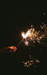 Preview wallpaper sparklers, sparks, hand, black
