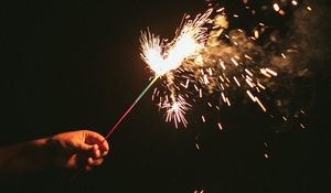 Preview wallpaper sparklers, sparks, hand, black