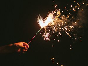 Preview wallpaper sparklers, sparks, hand, black