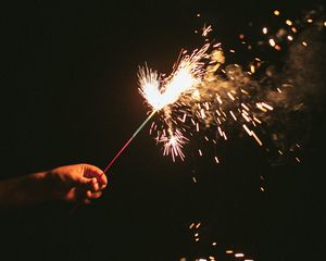 Preview wallpaper sparklers, sparks, hand, black
