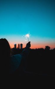 Preview wallpaper sparklers, sparks, hand, man, silhouette