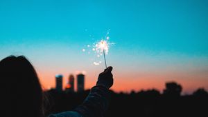 Preview wallpaper sparklers, sparks, hand, man, silhouette