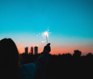 Preview wallpaper sparklers, sparks, hand, man, silhouette