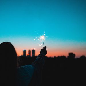 Preview wallpaper sparklers, sparks, hand, man, silhouette