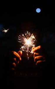 Preview wallpaper sparklers, sparks, hands, glow, dark