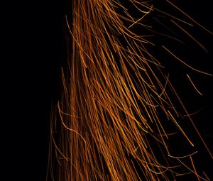 Preview wallpaper sparks, long exposure, abstraction, dark