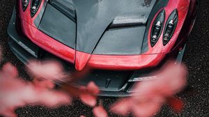 Preview wallpaper sports car, car, aerial view, flowers