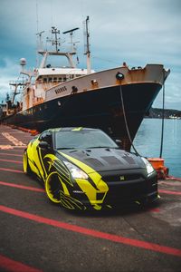 Preview wallpaper sports car, car, front view, ship, pier