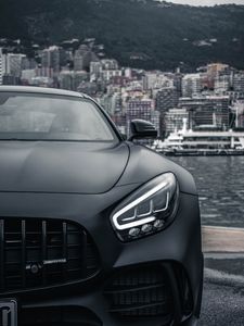 Preview wallpaper sports car, car, front view, black, city