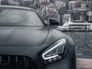 Preview wallpaper sports car, car, front view, black, city