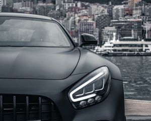 Preview wallpaper sports car, car, front view, black, city