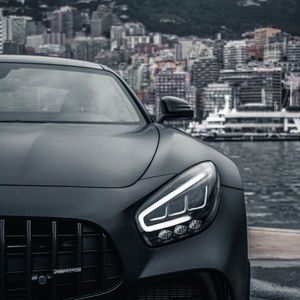 Preview wallpaper sports car, car, front view, black, city