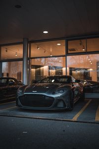 Preview wallpaper sports car, car, gray, front view, headlights