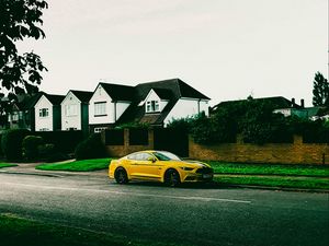 Preview wallpaper sports car, car, side view, yellow, street