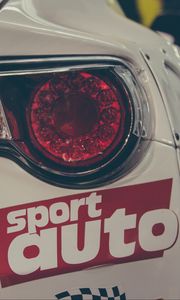 Preview wallpaper sports car, lights, sticker, inscription