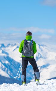 Preview wallpaper sportsman, skiing, mountain, top, tourist