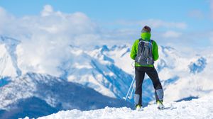 Preview wallpaper sportsman, skiing, mountain, top, tourist