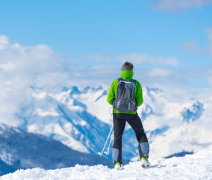 Preview wallpaper sportsman, skiing, mountain, top, tourist