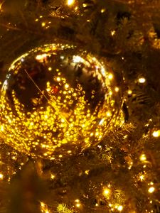Preview wallpaper spruce, ball, branches, garland, glare, new year, christmas