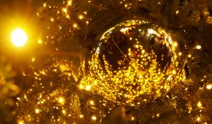 Preview wallpaper spruce, ball, branches, garland, glare, new year, christmas