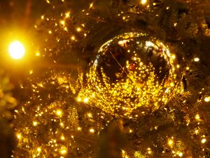 Preview wallpaper spruce, ball, branches, garland, glare, new year, christmas