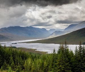 Preview wallpaper spruce, lake, slope, hills, clouds