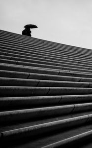 Preview wallpaper staircase, bw, umbrella, loneliness