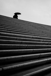 Preview wallpaper staircase, bw, umbrella, loneliness