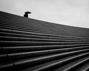 Preview wallpaper staircase, bw, umbrella, loneliness