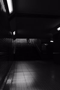 Preview wallpaper stairs, man, dark, bw