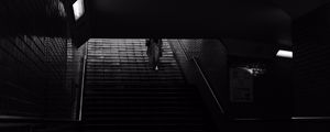 Preview wallpaper stairs, man, dark, bw