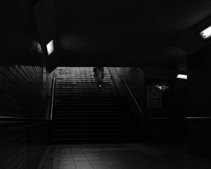 Preview wallpaper stairs, man, dark, bw