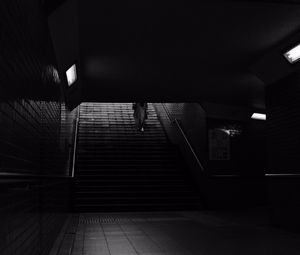 Preview wallpaper stairs, man, dark, bw