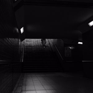 Preview wallpaper stairs, man, dark, bw