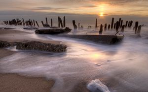 Preview wallpaper stakes, coast, foam, decline