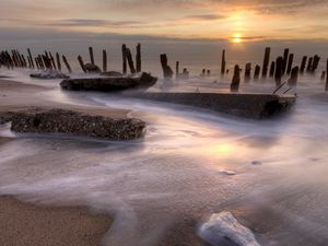Preview wallpaper stakes, coast, foam, decline