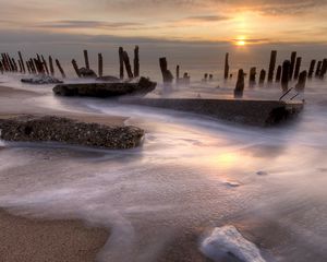 Preview wallpaper stakes, coast, foam, decline